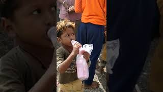 Slum child in Jalgaon enjoys flavoured milk donated by Kunal Ravindra \u0026 friends