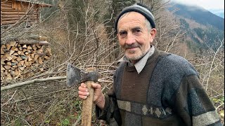 The Hard Life Of A 78-year-old Grandfather In A Mountain Village Gathering Firewood For The Winter