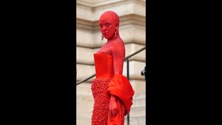 Doja Cat is unrecognisable covered in red crystals at Schiaparelli fashion show