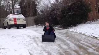 Hannah sledding