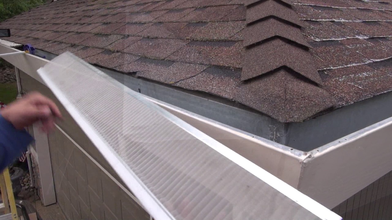 Installing Gutter Guards On An Asphalt Shingle Roof - YouTube