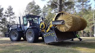 STARK KAH 2000 ST Bucket Sweeper dry cleaning the church lawn in Lapinlahti