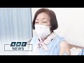 Japan finally begins mass vaccinations for seniors | ANC