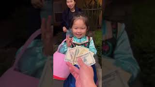 Handing out cash to trick-or-treaters on Halloween 🎃