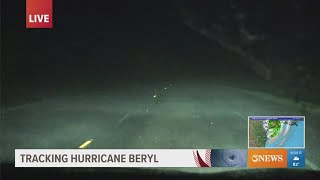 Bill Churchwell and Jeremy Landers make their way from Port Lavaca to Palacios to see Hurricane Bery