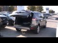 Haroon Qureshi showing how the hands-free liftgate works on a 2014 Ford Escape