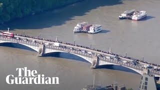 Thousands of people queue in London to see Queen's lying in state