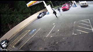 RAW FOOTAGE: Bystanders run for cover when shots ring out outside west Charlotte gas station