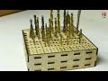 organizer for drills made of laser cut plywood.