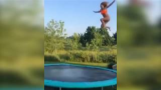 Girl jumps off roof to trampoline to pool SIDE (slo-mo and regular speed)