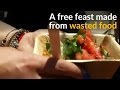 People enjoy free meal made of discarded food