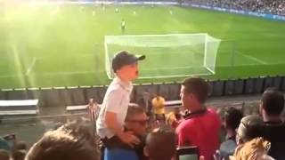 Young Fan Leads The Terraces