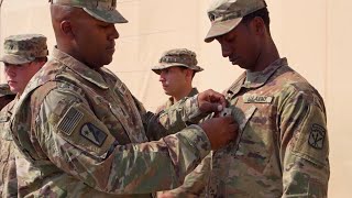 A Touching Moment: Father Awards Son New Rank during Deployment