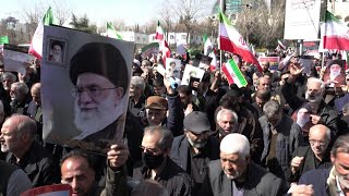 Hundreds gather in Tehran for Friday prayers and to protest against US-Israeli strikes | AFP