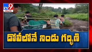Tribals carry pregnant woman on ‘doli’ in Visakhapatnam - TV9