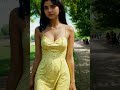 lilian wears a yellow midi sweetheart dress from urban outfitters in a park fashion