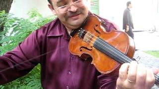 Marin Bunea shows off an old fiddlers trick