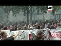 Protesters clash with riot police in Paris