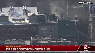 Sky5 is flying over a fire that has broken out on Hanover Street in the North End of Boston.