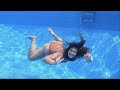 Swimming Alone Underwater in Swimming Pool