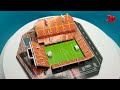 mini replica of anfield stadium. putting together a 3d puzzle. team liverpool