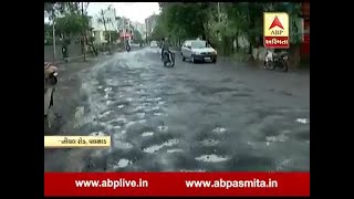 Tithal road damage after heavy rain in Valsad