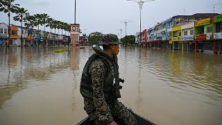 Malaysian towns flooded because of 'unusual' torrential rains