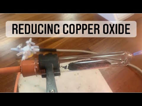 What happens when ammonia is passed over red hot copper oxide?