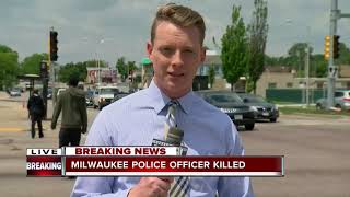 Police remember off-duty Milwaukee Officer Kou Her, killed while driving home from work