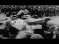 millions of people pass by the catafalque bearing the body of pope john xxiii in ...hd stock footage