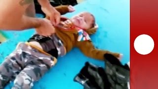 Drowning migrant toddler miraculously revived by Turkish fishermen