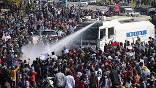 Tanks deployed and shots fired at protesters as Myanmar tensions rise