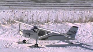 Ultravia Pelican P.L. Takeoff On Skis On Frozen Pond CSU3