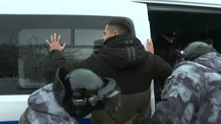 Russian special forces arrest protesters on Moscow outskirts | AFP