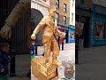 golden statue man performance coventgarden statue