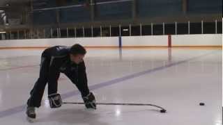 How to pick up 2 hockey pucks