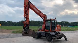 Testing video of mobile excavator: Doosan DX140W, year 2008 (Refnr. BM3384) — good condition