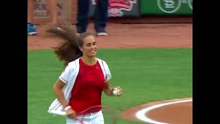 Monica Puig throws out Cincinnati Red's first pitch