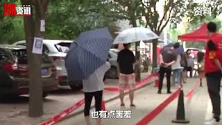 扬州一防疫志愿者热情揽客走红，探身摆小手太可爱，本人回应来了