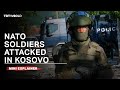 Kosovo clashes: Dozens of NATO-led soldiers injured by Serb protesters