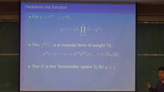 Park, Jinsung (KIAS) / A generalization of the Dedekind eta function over Teichmuller spaces