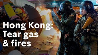 Hong Kong: Fire and tear gas as anti-government protests escalate