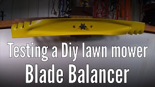 Testing a Diy lawn mower blade balancer made with scrap wood and hardware