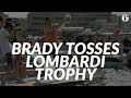 Tom Brady tosses Lombardi Trophy to another boat during Super Bowl boat parade