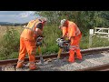 Robel vertical tamper in use on the GWSR