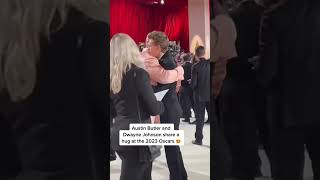 Austin Butler and The Rock have a hug at the Oscars!
