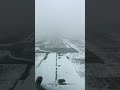 boeing b767 landing in snow milan malpensa mxp 35l. italy. 1080p hd