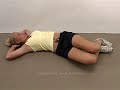 supine trunk rotation back exercise video