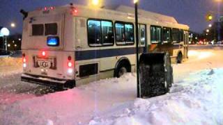 BLIZZARD NYC 2010  bus stuck in snow