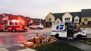 Watch Postal Worker Save Holiday Packages From Burning In Mail Truck Fire